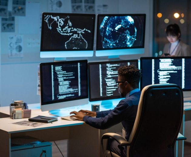 young-contemporary-cyber-security-manager-typing-in-front-of-computer-e1696735578231